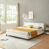 A bedroom scene with a white bed, yellow blanket, and a large window. Náhľad obrázku produktu