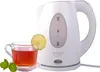 A white electric kettle with a clear glass cup of tea next to it. Voir les images du produit