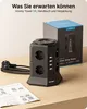 A black Voomy Tower S8 power strip is shown on a wooden surface, with its packaging in the background and an instruction manual in the foreground. Produktbild-Vorschau