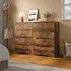 A bedroom scene with a dresser, a hat rack, and a window. Podgląd zdjęcia produktu