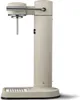 A sand-colored AARKE Carbonator 3 water carbonator with a silver lever and nozzle, shown against a white background. Produktbild-Vorschau