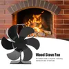 A black wood stove fan is shown in front of a lit fireplace. Anteprima dell’immagine prodotto