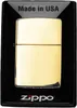 A gold Zippo lighter is displayed in its black packaging. Podgląd zdjęcia produktu
