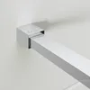 A close-up view of a chrome shower support bracket attached to a wall. Anteprima dell’immagine prodotto