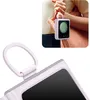 A person is holding a small square device with a circular screen attached to a bag. Anteprima dell’immagine prodotto