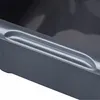 A close-up view of the edge of a dark gray plastic basin with a molded handle. Anteprima dell’immagine prodotto