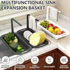 A kitchen sink expansion basket filled with fruits and vegetables, placed over a kitchen sink. Produktbild-Vorschau