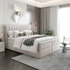 A bedroom scene with a bed as the main focus.