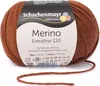 A ball of brown merino wool yarn with its label. Náhled obrázku produktu