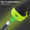 Close-up of a USB-C charging port on a device, with a charging cable being inserted. Produktbild-Vorschau