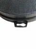 Close-up view of a black filter with a textured grid surface and a handle loop. Produktbild-Vorschau