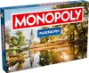 A Monopoly board game box featuring a city scene. Produktbild-Vorschau