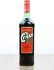 A bottle of Cynar liqueur on a wooden surface against a white background. Produktbild-Vorschau