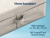 A close-up of a folded mattress with a handle and text overlays. Produktbild-Vorschau