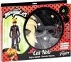 The image shows the retail packaging for a Cat Noir costume from Miraculous. The packaging displays a picture of the costume on the left and the costume components inside a clear window on the right. Text and branding are visible on the packaging. Produktbild-Vorschau