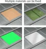 A collage of four images showing different materials (wood, green textured glass, bright green sheet, and a metallic sheet) placed on a honeycomb worktable with rulers on the sides. Náhled obrázku produktu
