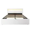 A white upholstered bed frame with a slatted base and integrated LED lighting in the headboard, shown against a white background. Náhled obrázku produktu