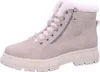 A single cream-colored winter boot with white faux fur lining and a thick white sole, shown against a white background. Anteprima dell’immagine prodotto