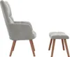 A grey velvet armchair and matching ottoman are shown from the side against a white background. Náhľad obrázku produktu