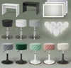 A collection of vanity table items including tables, stools, and a mirror with lights. Anteprima dell’immagine prodotto