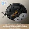 Underside view of a robot vacuum cleaner with its internal components exposed, highlighting its anti-tangle technology. Produktbild-Vorschau