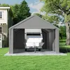 A large grey tent garage with a white trailer inside, set up on a grassy lawn next to a house and a large tree. Produktbild-Vorschau