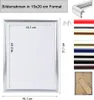 A product image showing a silver picture frame with dimensions and a variety of color options for the frame material. The back of a frame is also shown. Produktbild-Vorschau