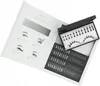 A set for DIY eyelash extensions is presented in an open box with instructions on the left and the product kit on the right. Produktbild-Vorschau