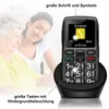 An older woman and a younger woman are looking at a senior-friendly mobile phone. The phone is in a charging cradle. Produktbild-Vorschau