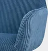 Close-up view of the armrest and seat of a blue corduroy chair. Produktbild-Vorschau