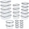 A collection of clear plastic food storage containers with black lids and seals, arranged in stacks. Produktbild-Vorschau