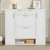 A white shoe cabinet with gold handles is shown in a room with a neutral background. Produktbild-Vorschau