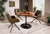 A round dining table with chairs in a modern dining room setting. Anteprima dell’immagine prodotto