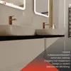 A modern bathroom with two sinks and faucets. Produktbild-Vorschau