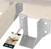 A close-up shot of metal joist hangers attached to wooden beams, with a product tag hanging from one of the hangers. Náhled obrázku produktu