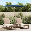 Two lounge chairs and a rectangular umbrella are set up on a patio. Náhled obrázku produktu