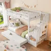 A white bunk bed with a pull-out trundle bed in a child's bedroom. Voir les images du produit