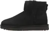 Side view of a black UGG boot. Voir les images du produit
