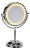A silver LED makeup mirror on a stand.