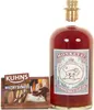 A bottle of Monkey 47 Sloe Gin next to a small display stand. Produktbild-Vorschau