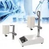 A laboratory setting with glassware and a homogenizer. Náhľad obrázku produktu
