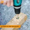 A hand is using a drill to bore a hole into a piece of wood, creating wood shavings. Produktbild-Vorschau