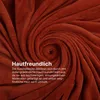 A close-up, swirled texture of a brown blanket with text overlay. Náhled obrázku produktu
