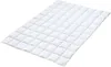 A white quilted duvet is shown from a slightly elevated angle against a white background. Náhled obrázku produktu