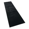 A black shaggy rug is shown from a slightly elevated angle against a white background. Voir les images du produit
