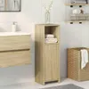 A bathroom setting with a cabinet, sink, and laundry basket. Podgląd zdjęcia produktu