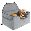 A dog is sitting in a gray pet car seat. Náhľad obrázku produktu