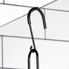 A close-up of a black metal S-hook hanging from a thin wire, against a white tiled background. Anteprima dell’immagine prodotto