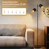 A floor lamp with two adjustable heads is shown next to a sofa, with a graphic overlay indicating recommended light bulbs. Produktbild-Vorschau