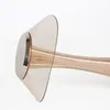 A close-up side view of a modern LED table lamp with a translucent brown shade and a silver base. Produktbild-Vorschau